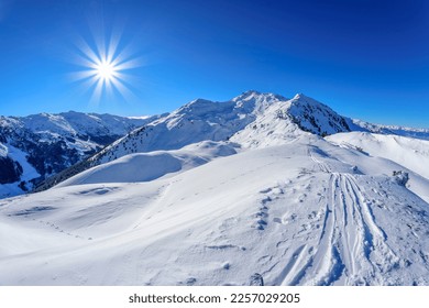 austria-tyrol-sun-shining-over-260nw-2257029205.jpg